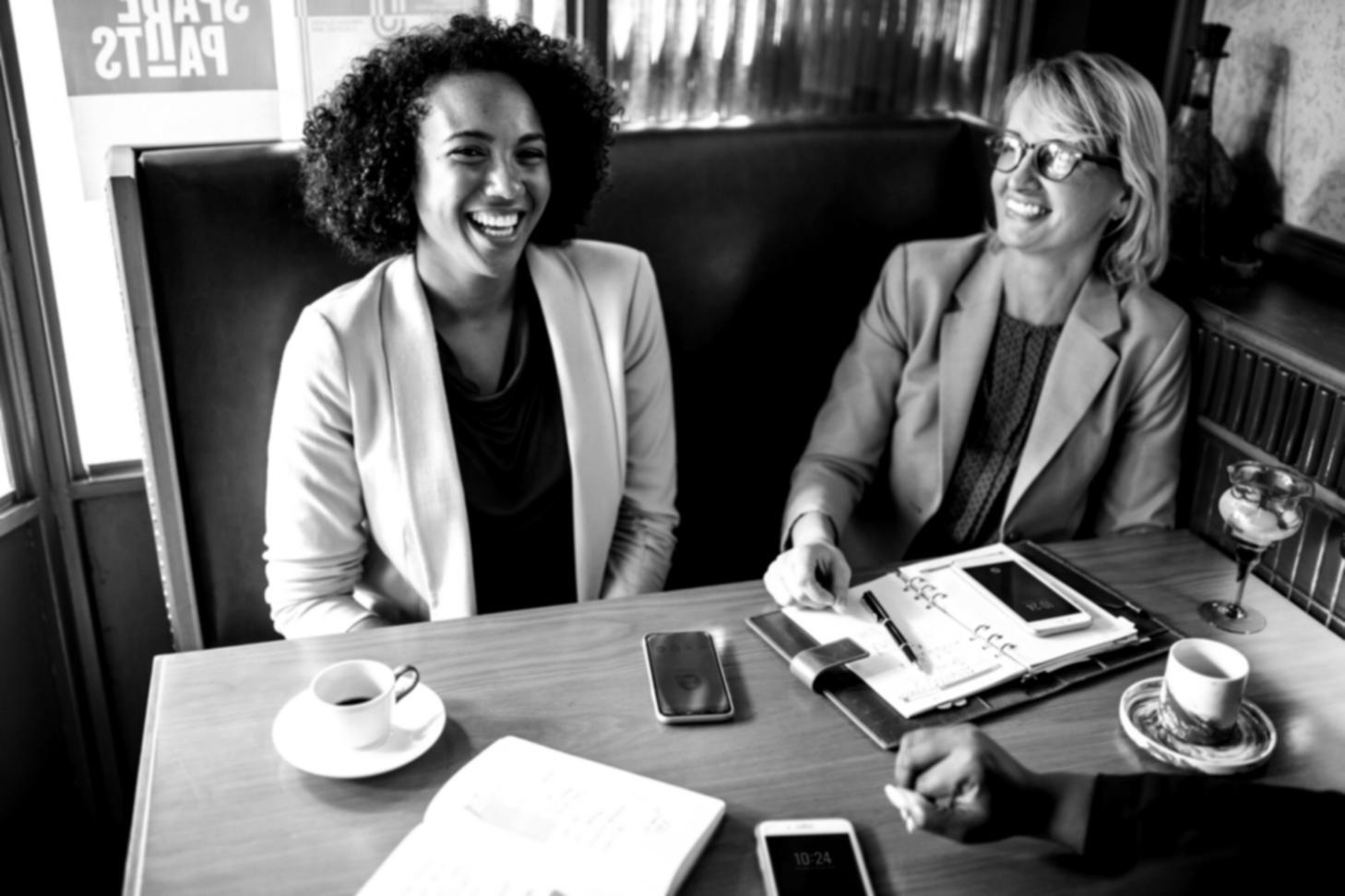 Investment education materials and planning documents spread across a desk